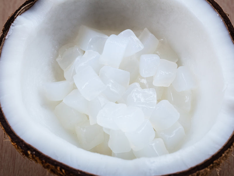 Coconut jelly bits in a coconut shell